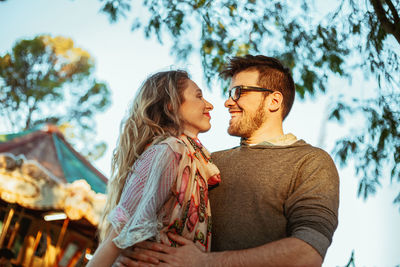 Young couple kissing outdoors