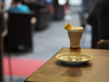 Close-up of drink served on table in restaurant