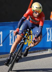 Man riding bicycle on road