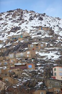 Aerial view of townscape and mountain in winter