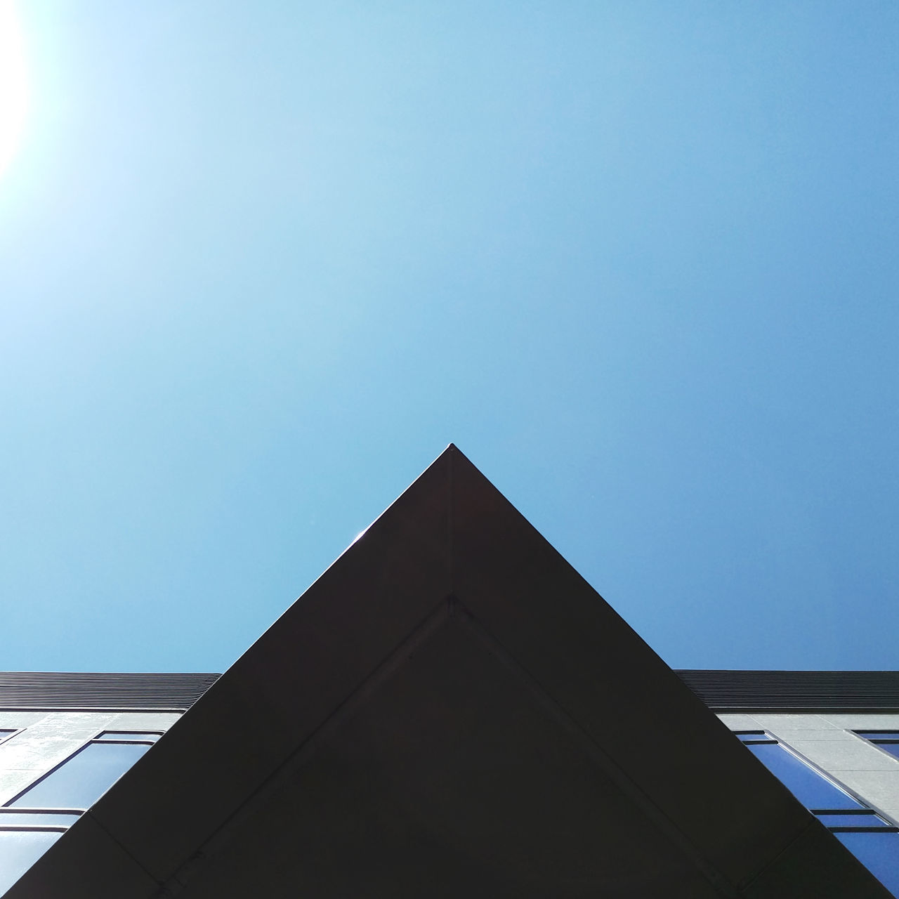 LOW ANGLE VIEW OF BUILDING AGAINST SKY