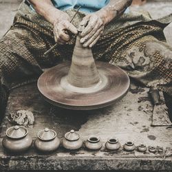 Full length of woman standing on tiled floor