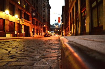 Narrow street along buildings