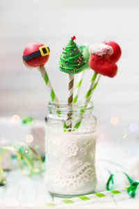 Christmas decorated cake pops, holiday background