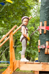 Full length of girl with arms outstretched