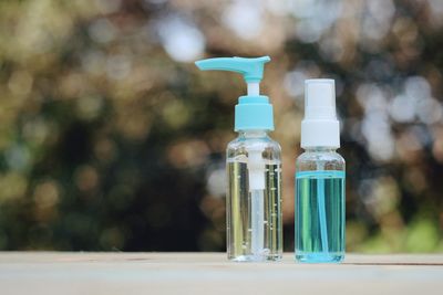 Close-up of glass bottle on table