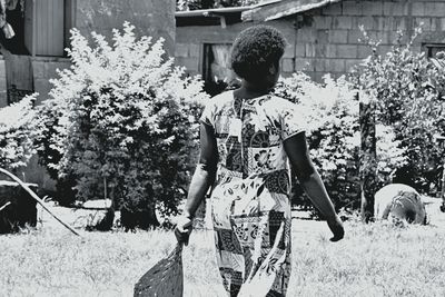 Close-up of woman standing in pond