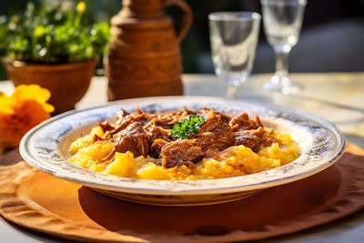 Close-up of food in plate on table