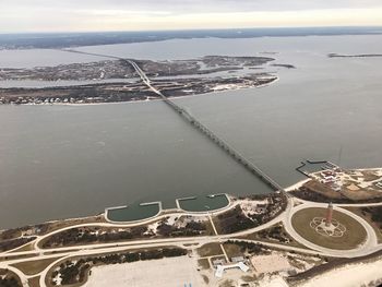 Close-up of airplane on bridge over sea