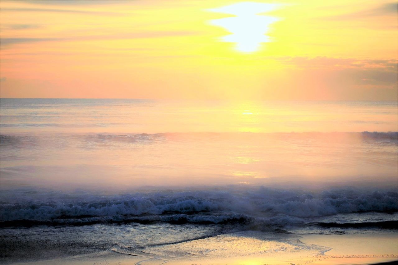 sunset, sea, scenics, beach, horizon over water, tranquil scene, beauty in nature, water, tranquility, sun, sky, orange color, shore, nature, wave, idyllic, sand, cloud - sky, reflection, surf