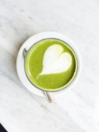 High angle view of matcha tea on table