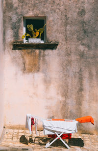 Chairs against wall in old building