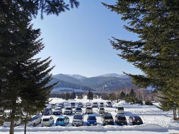 Scenic view of snowcapped mountains against sky during winter