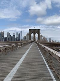 View of brooklyn bridge against cloudy sky