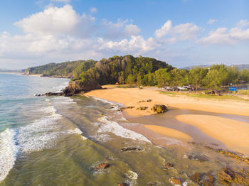 Scenic view of beach against sky