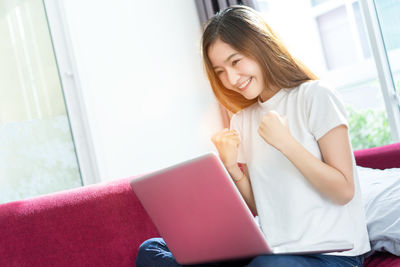 Teenage girl using mobile phone