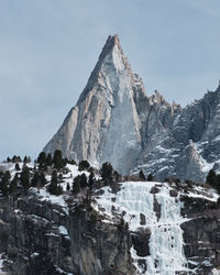 Panoramic view of snowcapped mountain against sky