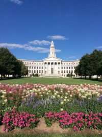 Civic center in front of town hall against sky