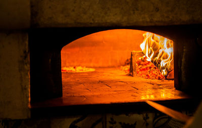 Close-up of fire on wooden floor