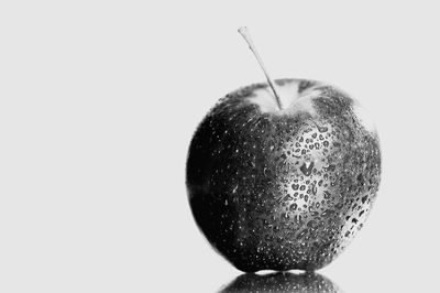 Close-up of apple against white background