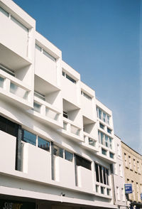 Low angle view of residential building against clear sky