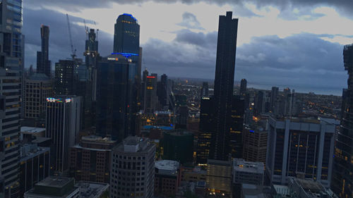 High angle view of buildings in city against sky