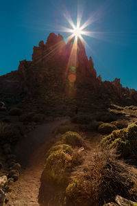 Low angle view of rock formation against sky