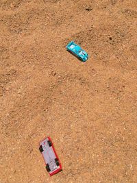 Red sand on beach