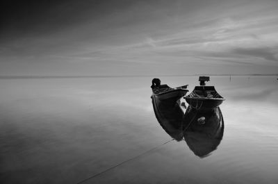 Nautical vessel on sea against sky