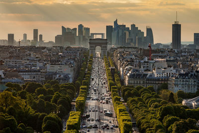 Aerial view of city buildings during sunset