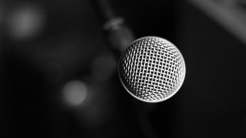 Close-up of lighting equipment against black background