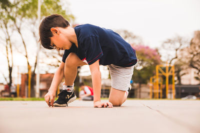 Boy playing in playground 