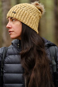 Rear view of woman wearing hat