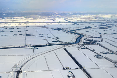 Aerial view of snow covered landscape