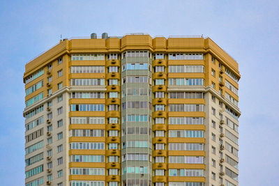 Low angle view of residential building against sky