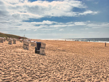 Scenic view of beach against sky