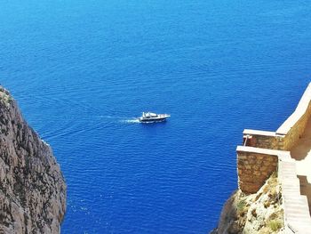 High angle view of boats sailing in sea