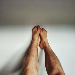 Low section of man hairy legs