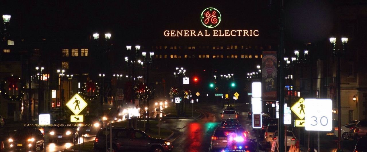 illuminated, text, night, western script, communication, transportation, non-western script, advertisement, commercial sign, city, sign, street, information sign, architecture, built structure, city life, large group of people, neon, road sign, lighting equipment