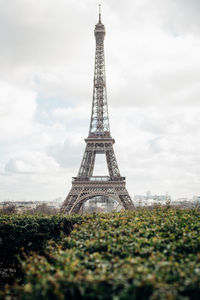 View of tower against cloudy sky