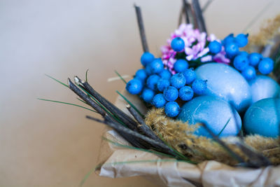 Close-up of eggs on blue table