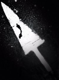 Shadow of people on road