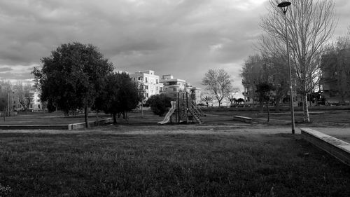 View of city against cloudy sky