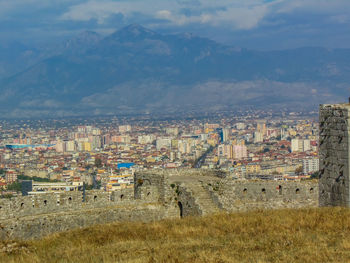 Aerial view of townscape against sky