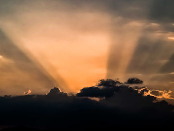 Low angle view of dramatic sky during sunset