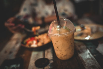 Close-up of coffee cup on table