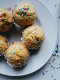 Close-up of muffins in plate on table