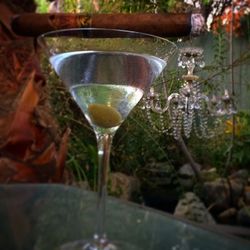 Close-up of wine glasses on table