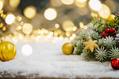 Close-up of christmas decorations on table