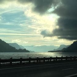 Scenic view of sea against cloudy sky